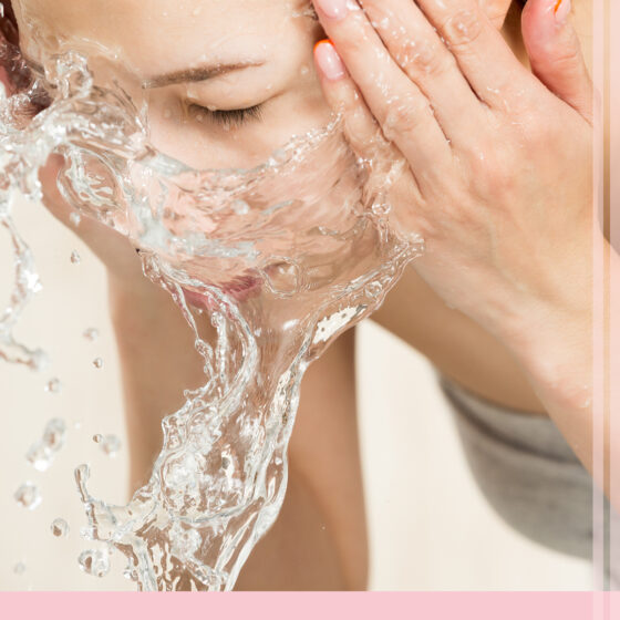 Woman Splashing face with water refreshing morning facewash